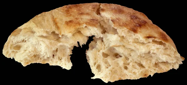 Stock image Leavened Flatbread Loaf Torn Half Isolated on Black Background