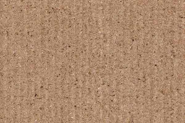 Утилизированный коричневый гофрированный фибровый картон грубой текстуры фон — стоковое фото