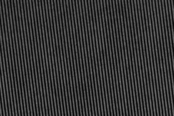 Textura de fondo de grunge grueso de cartón de fibra corrugada negro reciclado — Foto de Stock