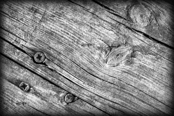 Eski yıpranmış kırık düğümlü gri çam ahşap döşemeler doku Vignetted — Stok fotoğraf