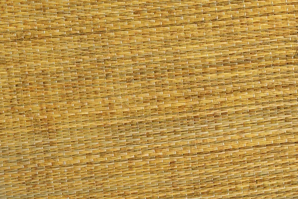 Коврик из натуральной шерстяной соломы под руководством грубой грубоватой грубости — стоковое фото