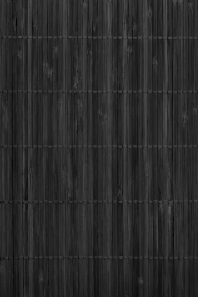 Negro rústico bambú lugar estera listones entrelazado grueso grunge T — Foto de Stock