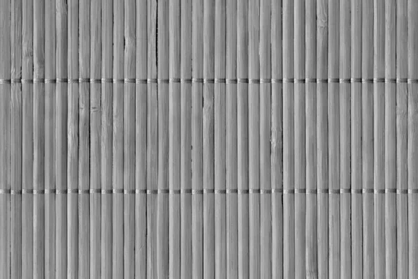 Сірий відбілений рустик щілинний бамбуковий килимок переплетений грубозерниста текстура гранжевого зерна — стокове фото