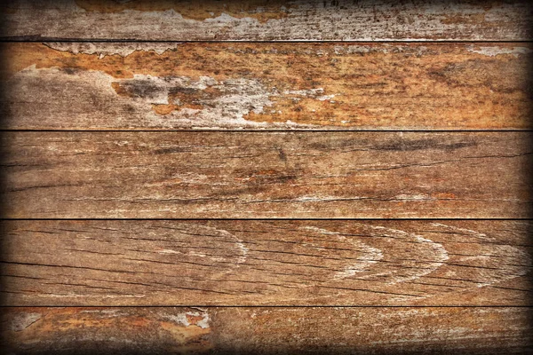 Gamla väderbitna ruttna knäckt knutna lackad furu plankor flagnande vinjett Grunge textur detalj — Stockfoto
