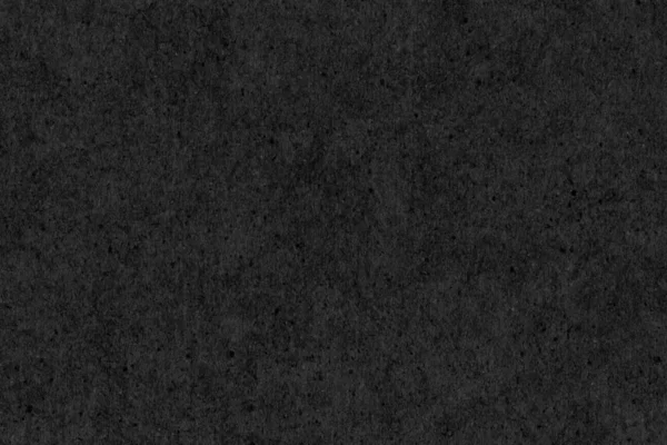 Fotografia ad alta risoluzione di carta riciclata nero grana grossa screziato grunge texture campione — Foto Stock