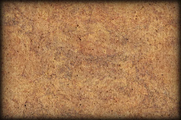 Yüksek çözünürlüklü fotoğraf geri dönüşüm kağıt kahverengi kaba tahıl benekli vignette grunge doku örneği — Stok fotoğraf