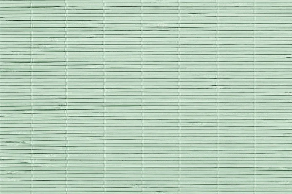 Alta resolución blanqueado verde pálido bambú rústico lugar estera Slat — Foto de Stock