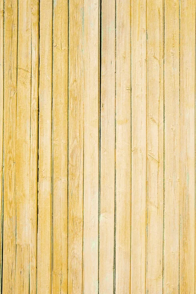 Текстура старої жовтої фарби на дерев'яних дошках Стокове Фото