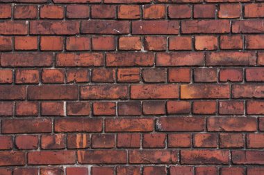 Kırmızı parlak tuğla duvar arka planı. Küçük fayanslar. Desenli duvar kağıdı.