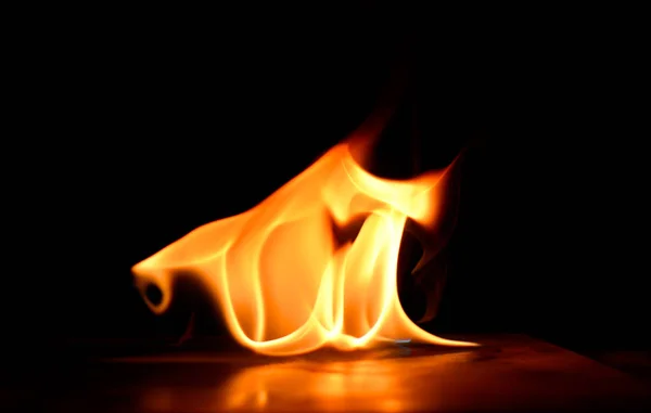 Fire flames on a black background. — Stock Photo, Image