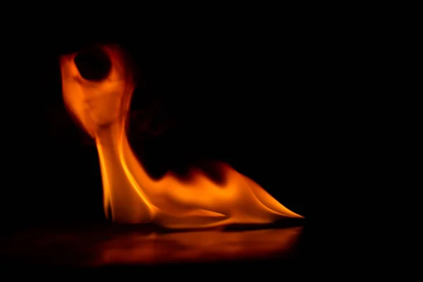Fire flames on a black background. — Stock Photo, Image