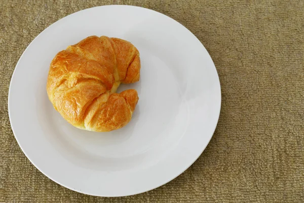 Croissants on a plate — Stock Photo, Image