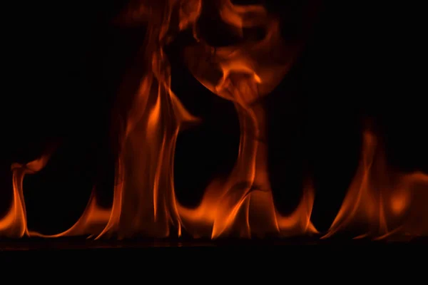 Fire flames on black background — Stock Photo, Image