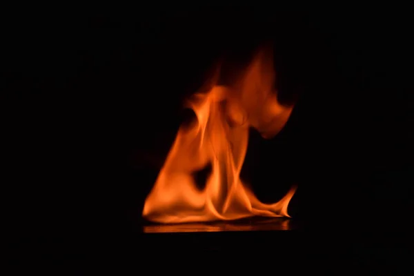 Fire flames on black background — Stock Photo, Image