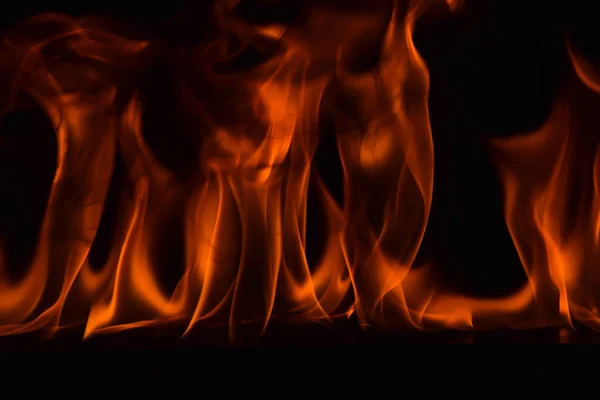 Fire flames on black background — Stock Photo, Image