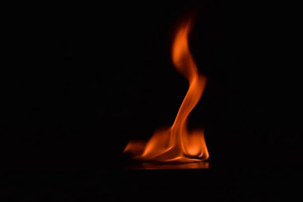 Fire flames on black background — Stock Photo, Image