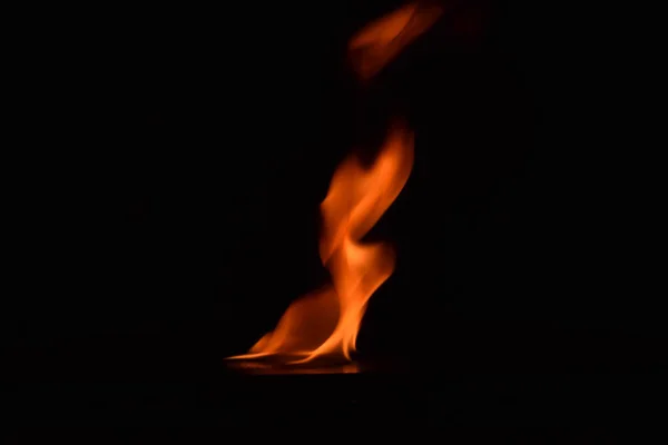 Fire flames on black background — Stock Photo, Image