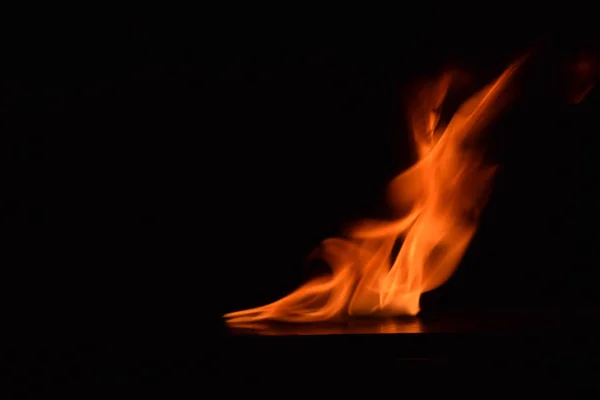 Fire flames on black background — Stock Photo, Image