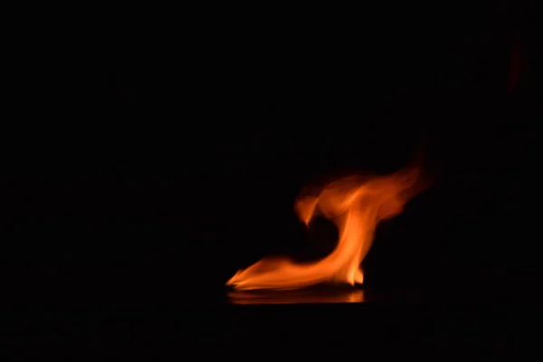 Fire flames on black background — Stock Photo, Image