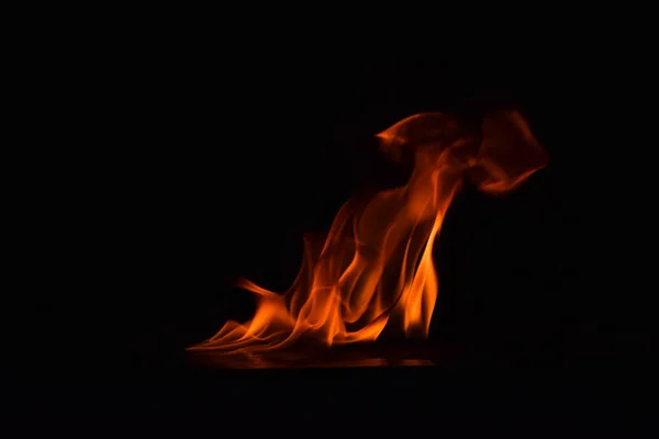 Chamas de fogo no fundo preto — Fotografia de Stock