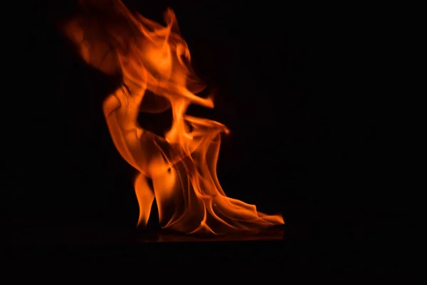 Fire flames on black background — Stock Photo, Image