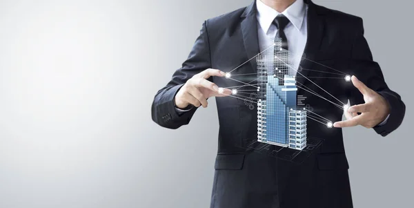 Business man create design modern skyscrapers in 3d render — Stock Photo, Image