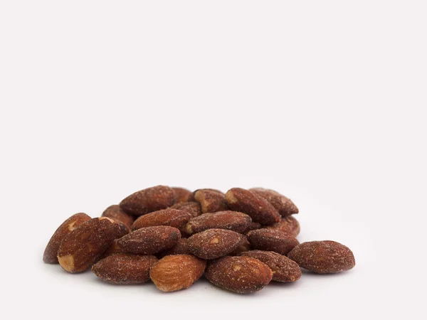 Almonds Placed on a white background. — Stock Photo, Image