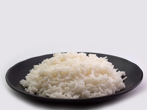 Bowl full of rice on white — Stock Photo, Image