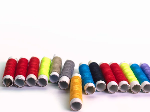 Row of colorful thread — Stock Photo, Image