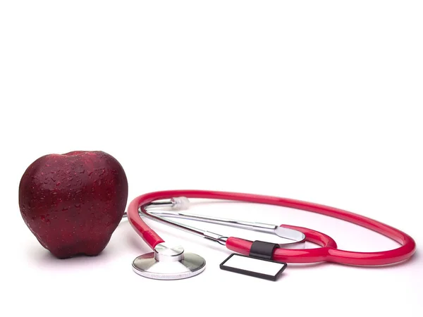 Roșu fructe de mere și căști medicale — Fotografie, imagine de stoc