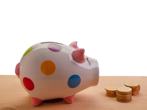 Piggy bank en munt, concepten in de financiering van bedrijven — Stockfoto