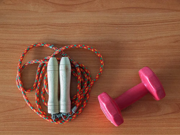 Jump rope and dumbbell , Sports Equipment.
