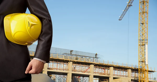 Engineer man standing with hard hat — Stock fotografie