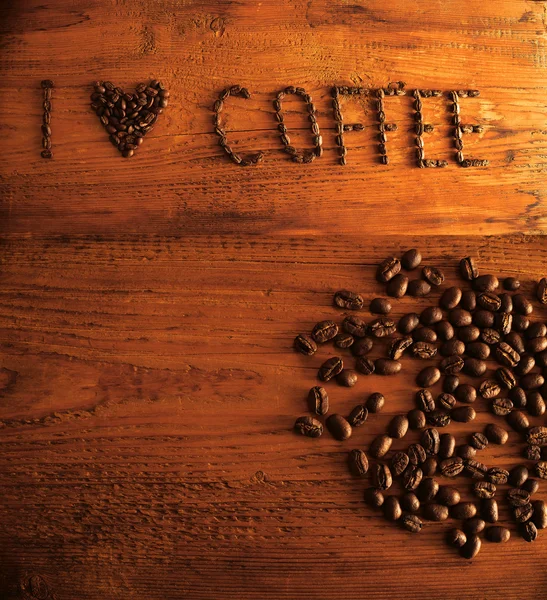 Надпись из кофейных зерен — стоковое фото