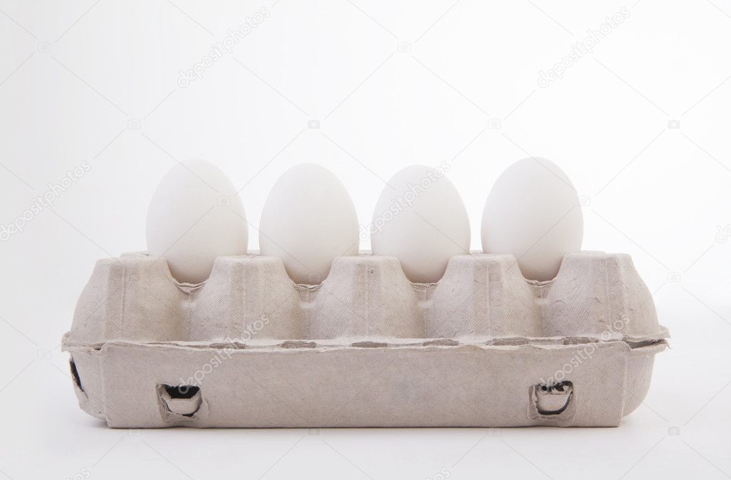 white eggs lie on cartoon box