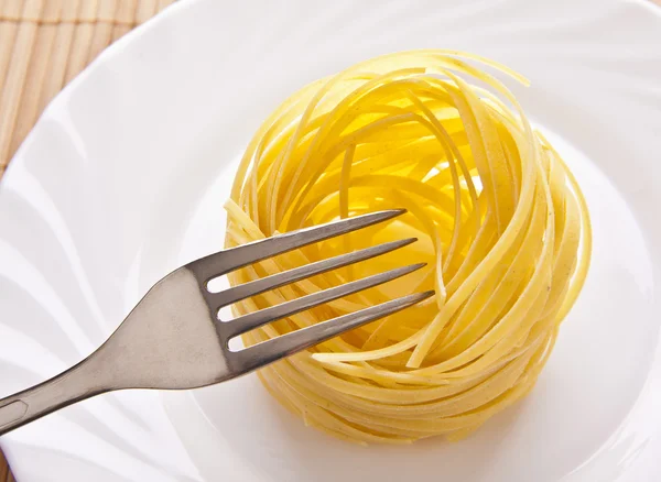 Ongekookte pasta nest — Stockfoto