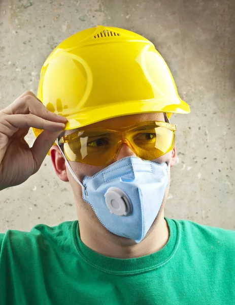 Worker Yellow Helmet Mask Concrete Wall Royalty Free Stock Photos