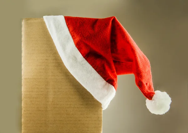 Rouleau de Noël vierge avec chapeau de Père Noël — Photo