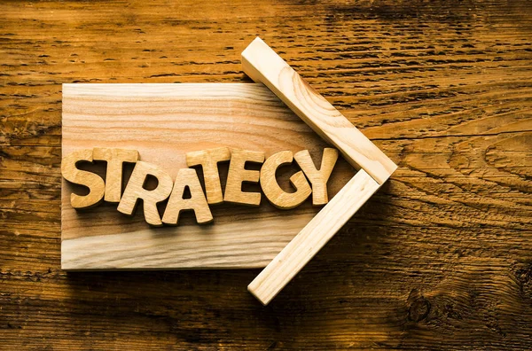 Ordet strategi tillverkad av trä bokstäver — Stockfoto