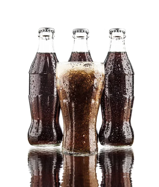 Tiga klasik Coke Bottles — Stok Foto