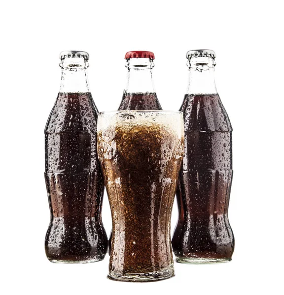 Drie klassiekers cokes flessen — Stockfoto