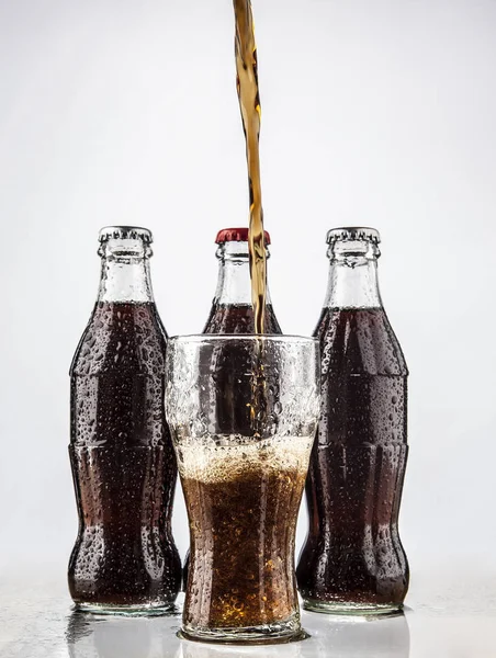 Három klasszikus Coke palackok — Stock Fotó