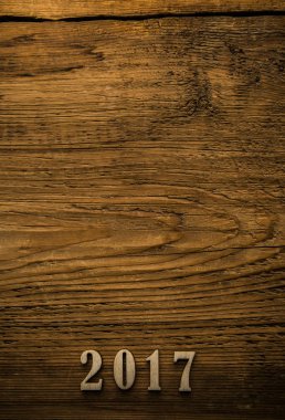 ahşap arka plan üzerinde sayılar yirmi on yedi