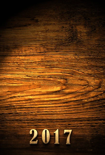 Numerais vinte e dezessete em fundo de madeira — Fotografia de Stock