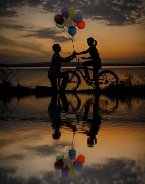 Silhouette Couple Man Giving Colorful Balloons Woman Sunset Cloudy Sky — Stock Photo, Image