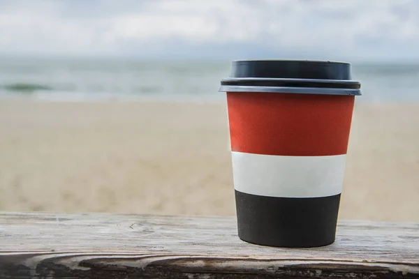 Plastic red and brown coffee cup — Stock Photo, Image