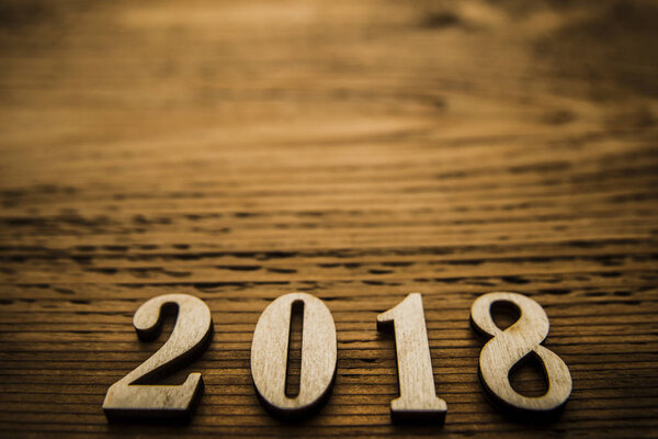  - деревянный номер на деревянном фоне
. 