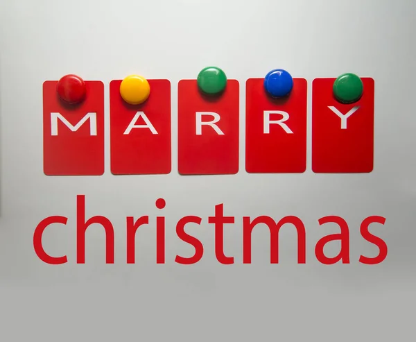 快乐圣诞文本上的磁铁 — 图库照片