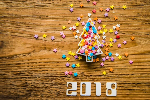 Árbol de Navidad con muchas estrellas coloridas —  Fotos de Stock