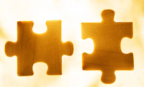 Hands trying to connect  puzzle pieces — Stock Photo, Image